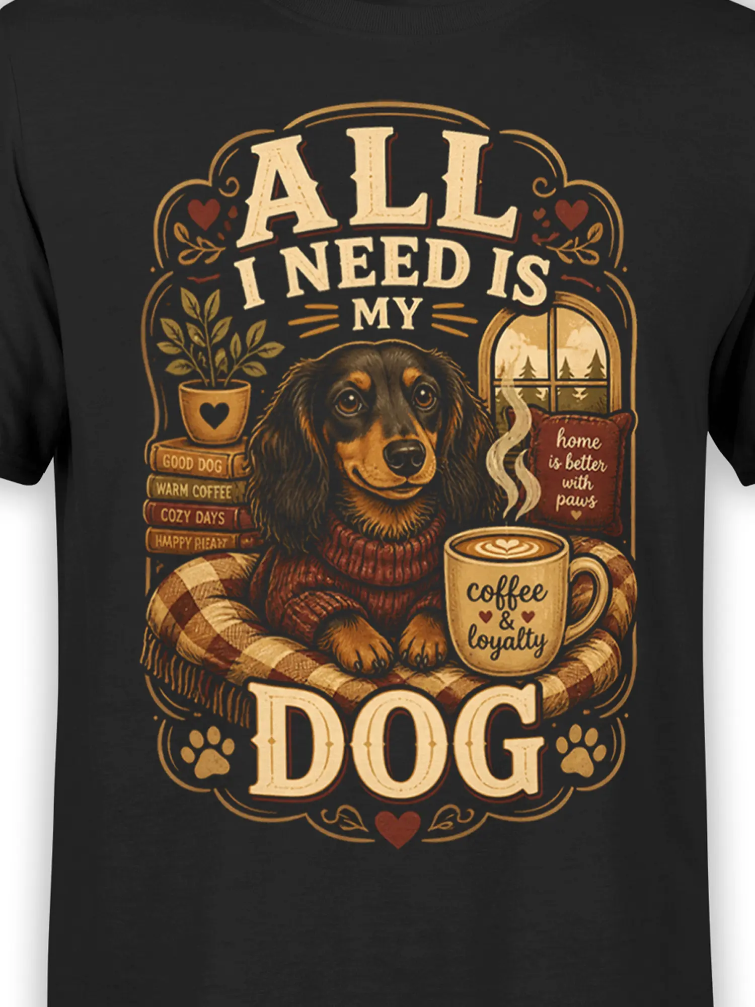 Close-up of cozy dog and coffee illustration with “All I Need Is My Dog” text on black cotton shirt