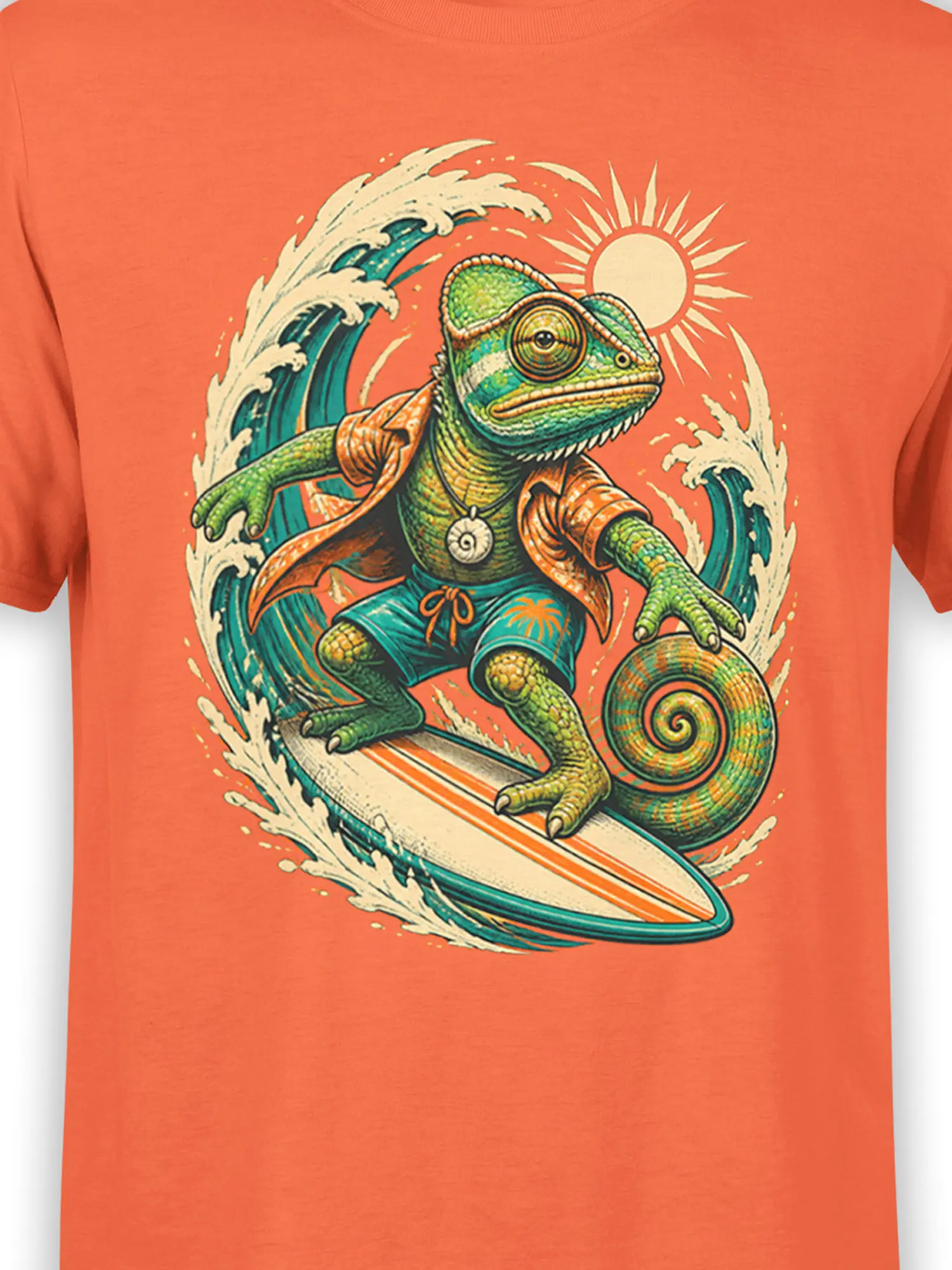 close-up of the surfing chameleon graphic with wave details and sun on the orange cotton shirt