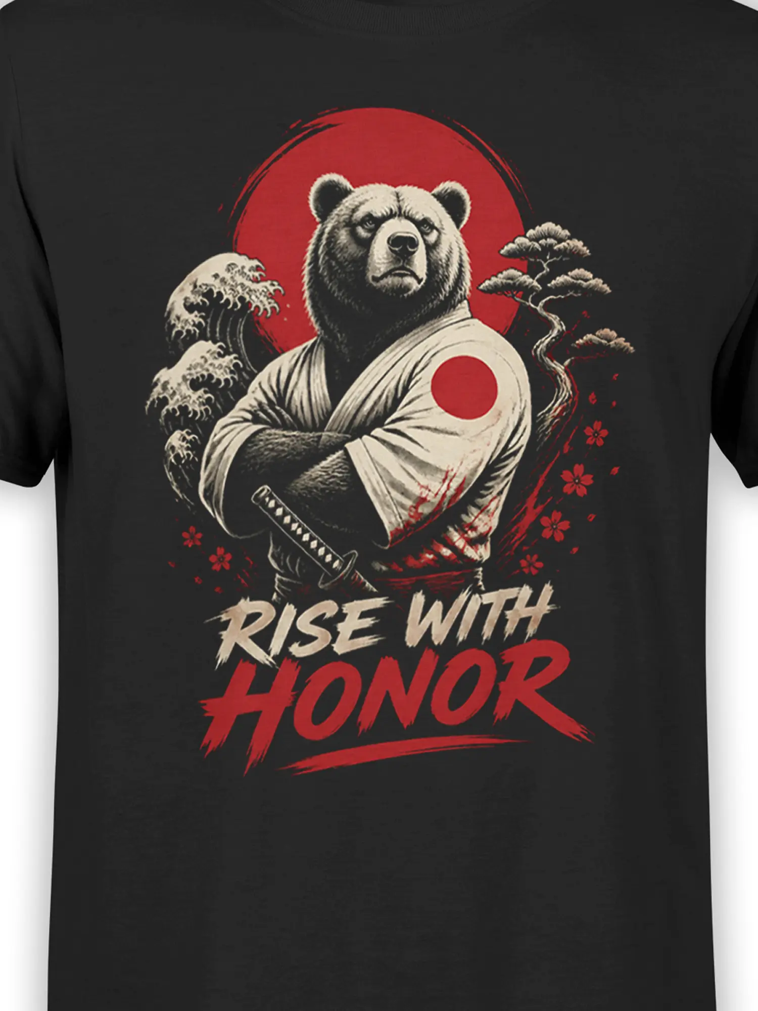 Close-up of samurai bear graphic with katana, red sun, waves and Rise With Honor text on black fabric