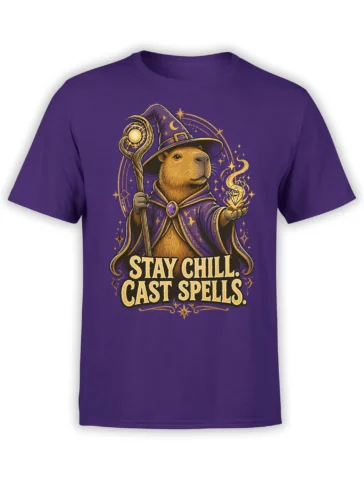 Purple unisex t-shirt featuring a wizard capybara with staff and glowing spell above Stay Chill Cast Spells text in gold