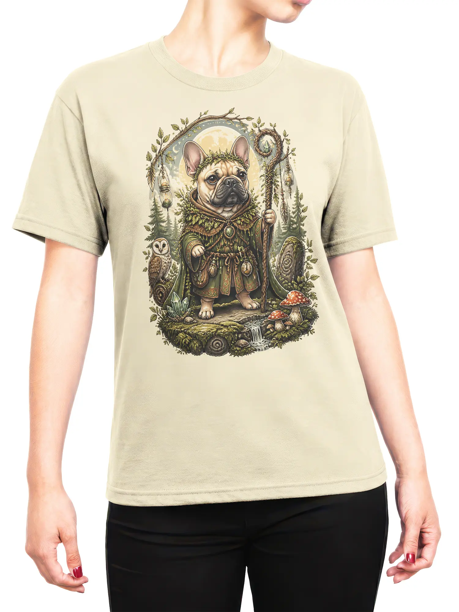Woman wearing beige French Bulldog druid T-shirt with fantasy forest illustration on the front