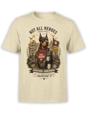 Beige unisex T-shirt with a detailed survivor Doberman graphic, wasteland city ruins, and “Not All Heroes Wear Capes” heroic text.