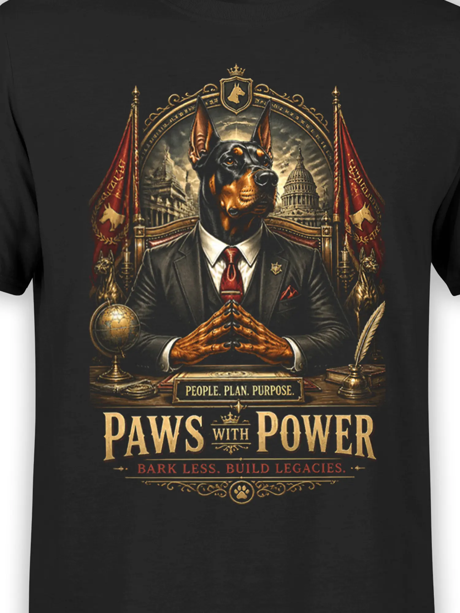 Close-up of the Doberman in a suit with detailed Paws With Power text and rich gold, red, and bronze vintage elements on black fabric