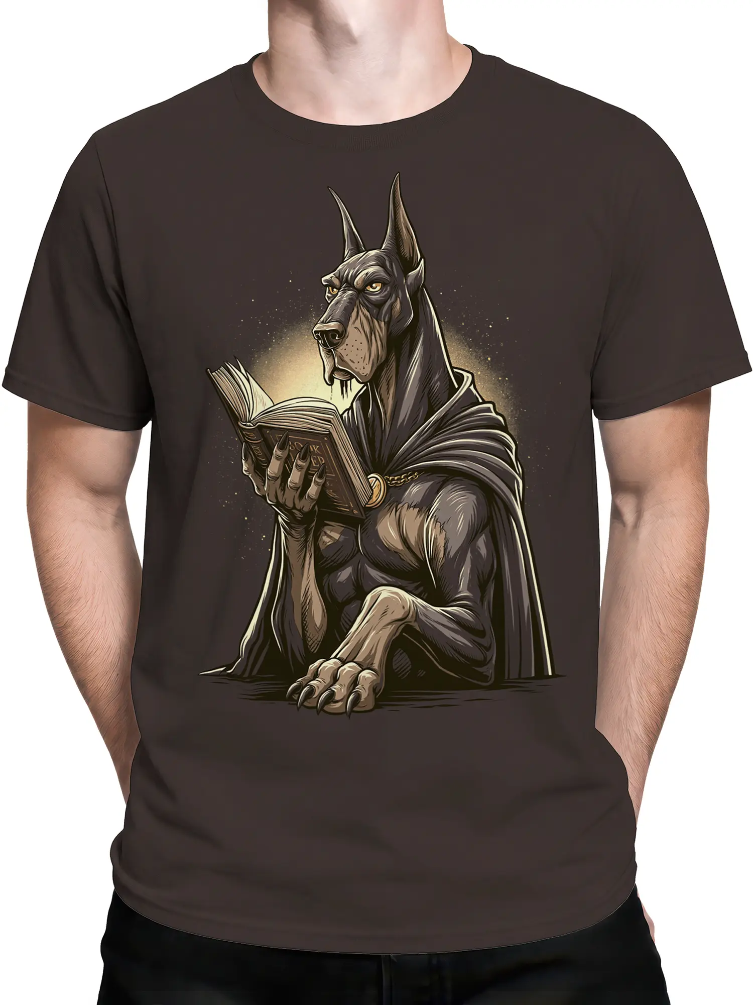 male model wearing brown mystic doberman t-shirt with cloaked dog reading an ancient glowing book