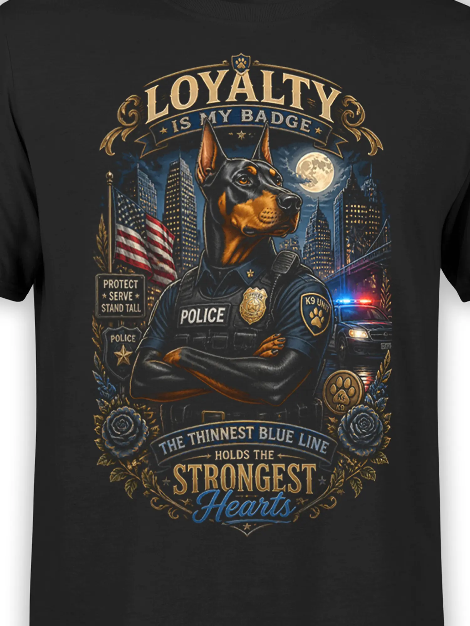 Close-up of Doberman K9 police officer artwork and loyalty quote on black T-shirt with ornate blue and gold thin blue line details.