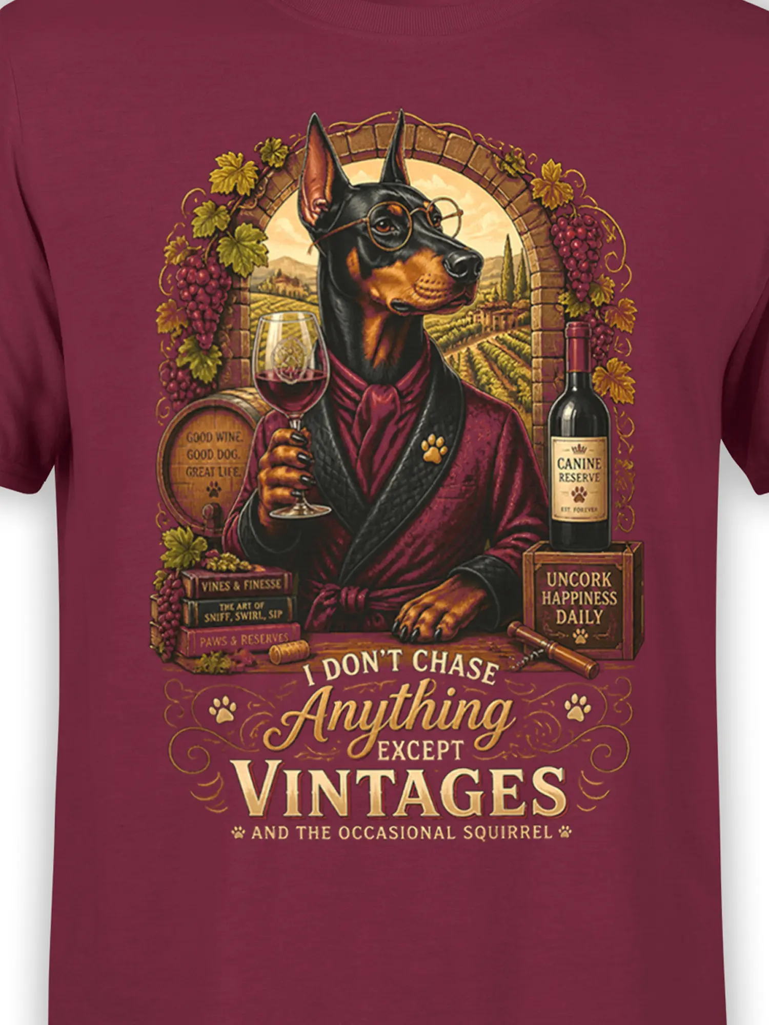 close-up of doberman wine lover design and vintage quote on burgundy cotton t-shirt