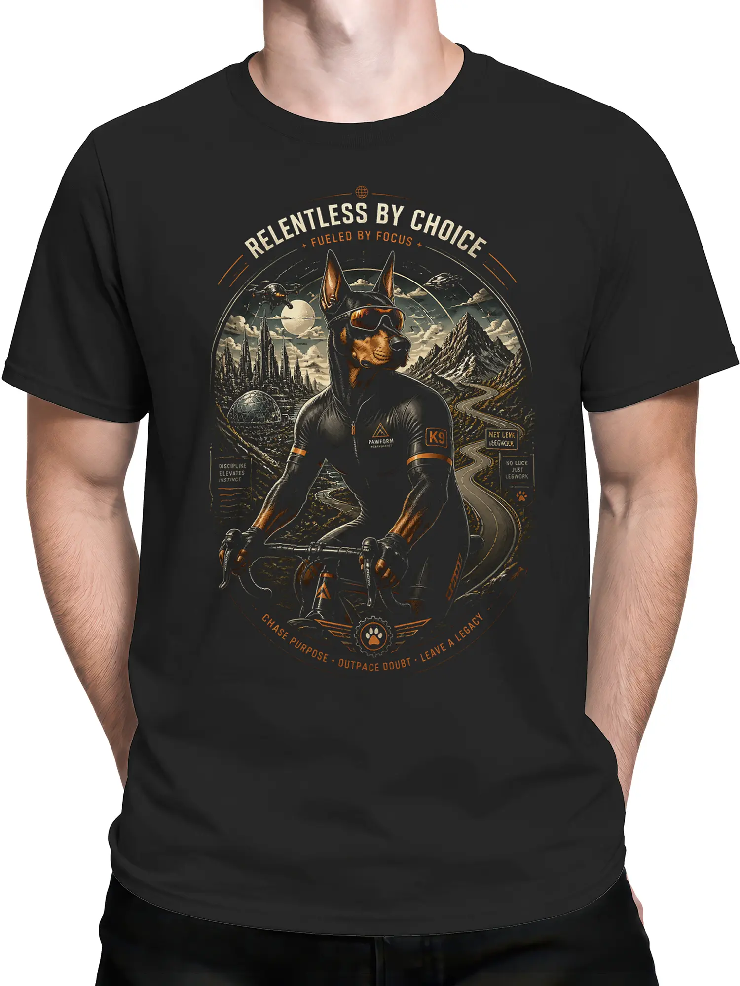 Man wearing black Doberman cyclist graphic tee with winding road and “Relentless by Choice” text