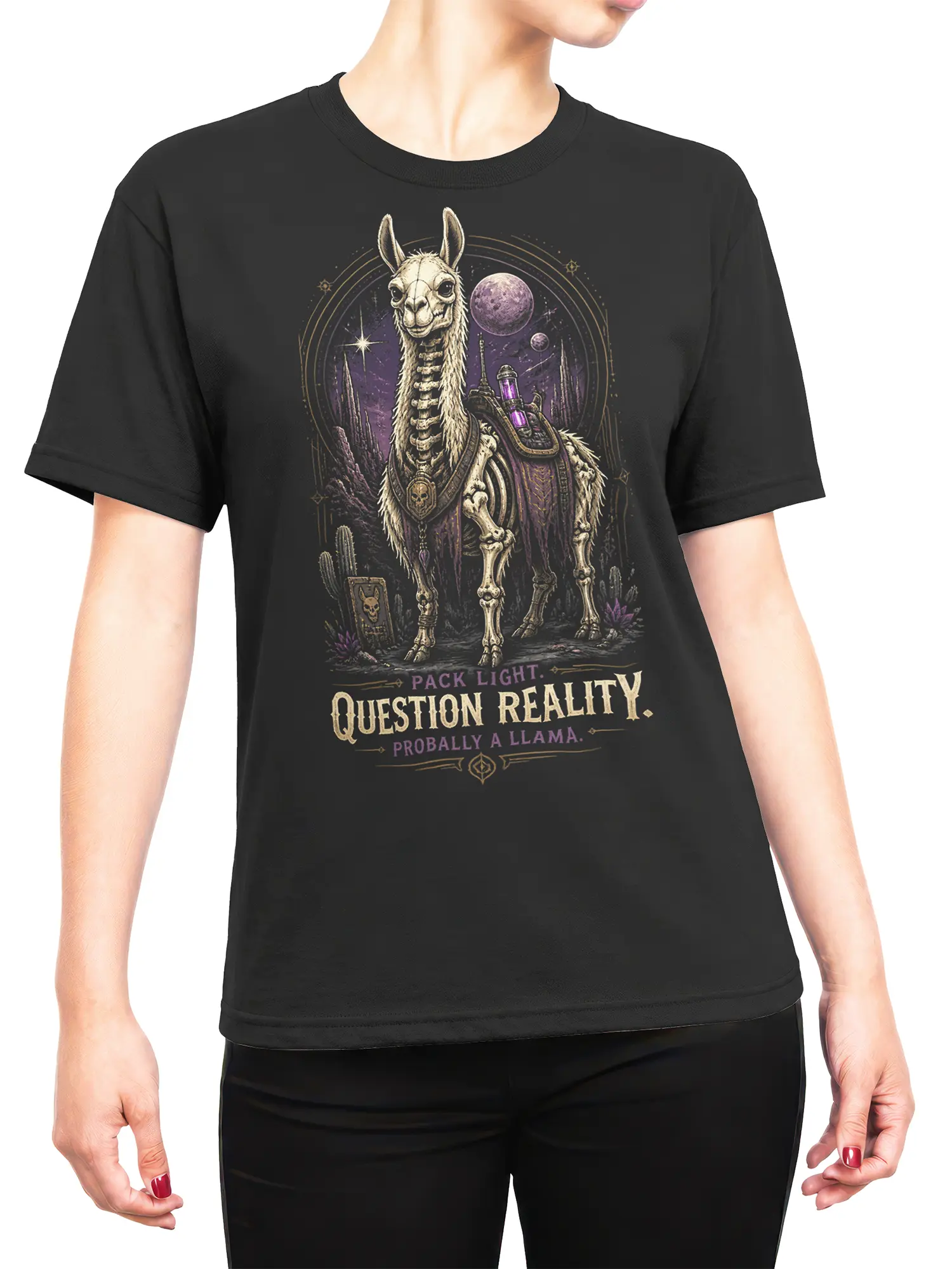 Woman wearing black skeletal space llama t-shirt with purple cosmic desert illustration