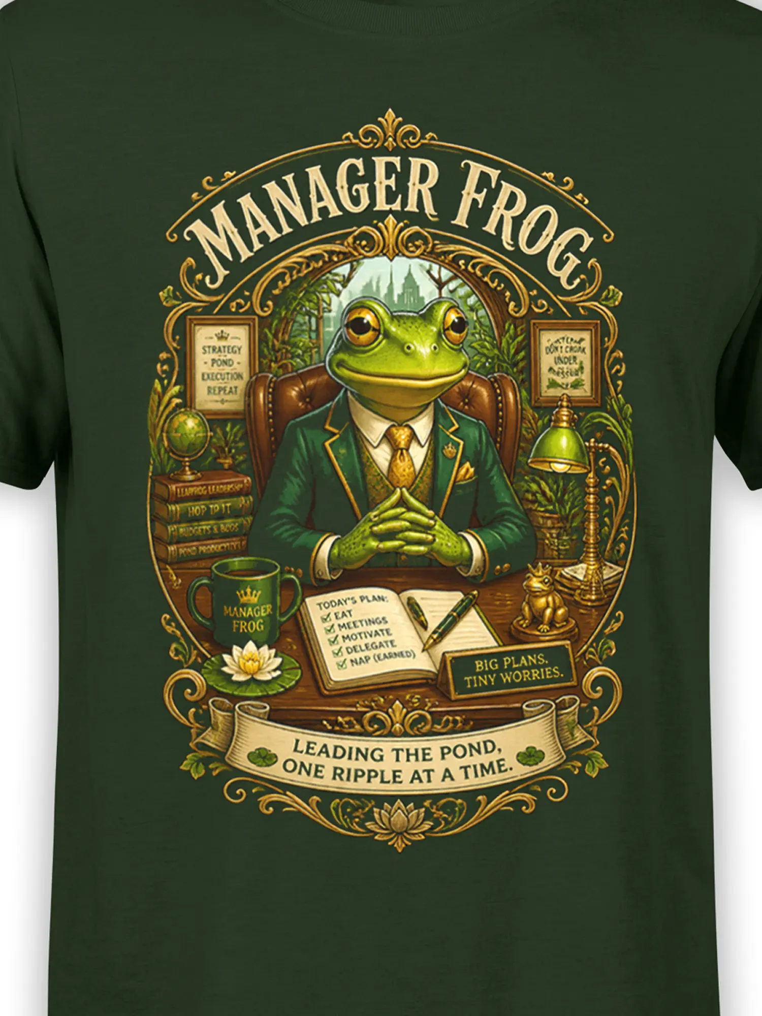 Close-up of the manager frog illustration showing the suited frog, desk, books, and banners on the green t-shirt
