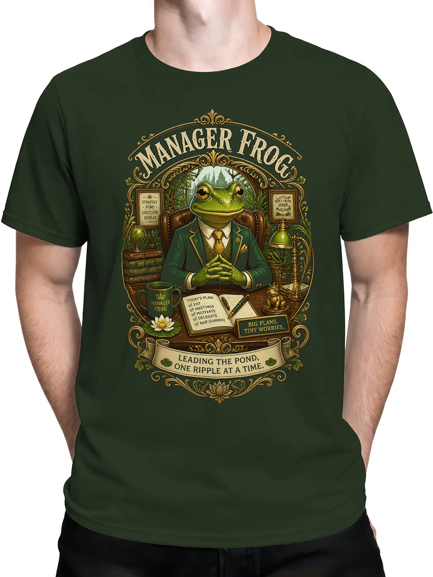 Man wearing the green manager frog t-shirt with ornate office illustration centered on the chest