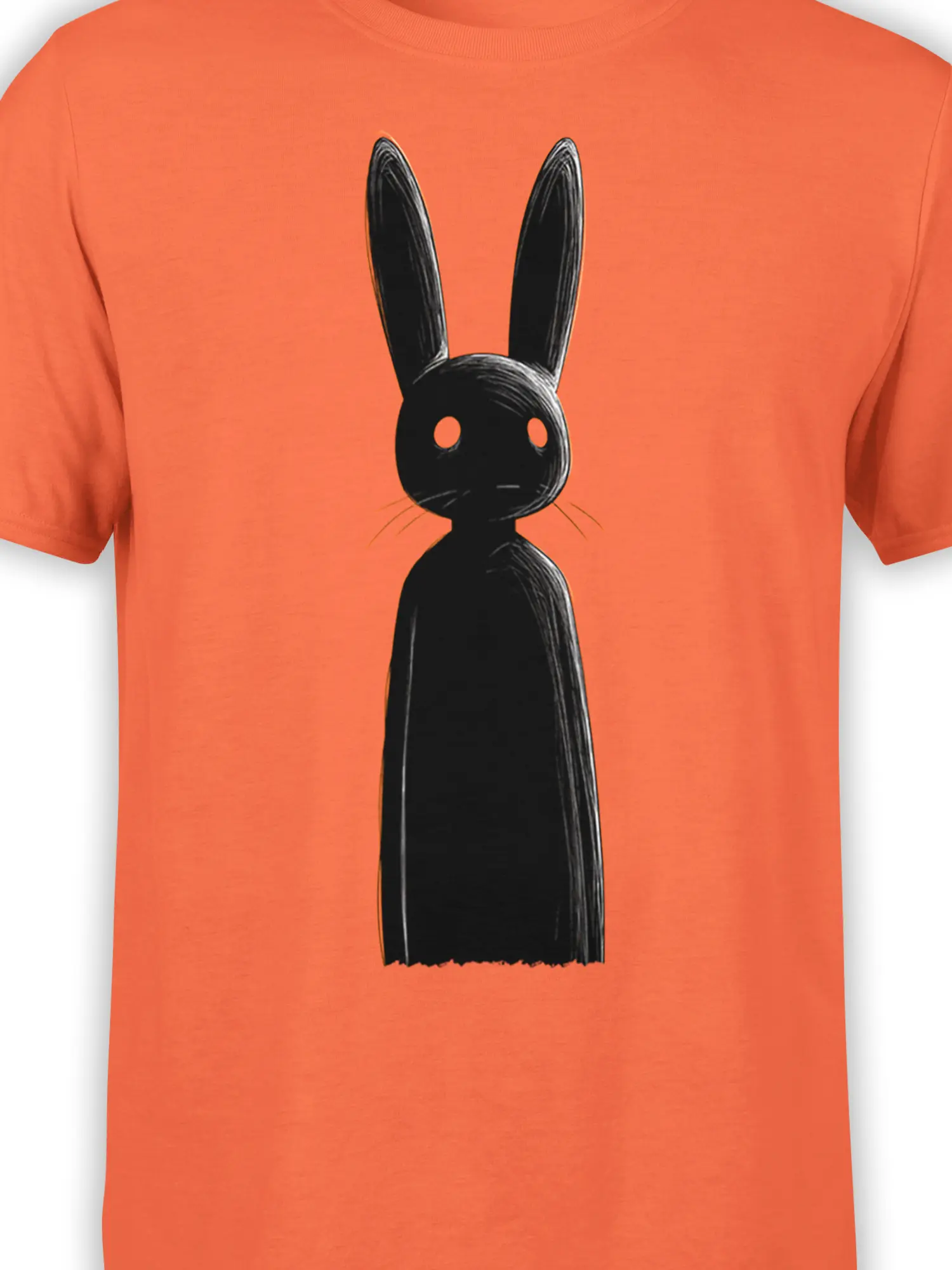 close-up of black shadow bunny graphic with long ears and hollow eyes on orange cotton fabric