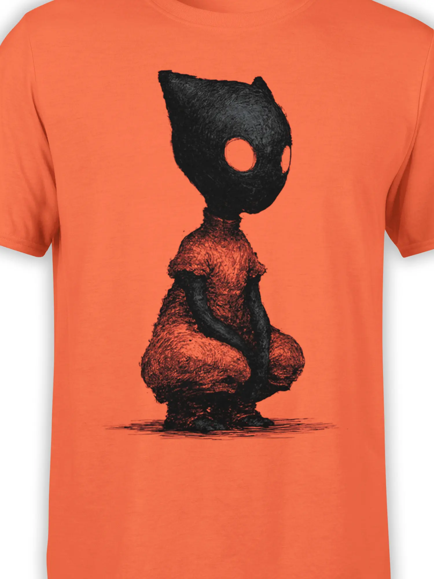 Close-up of black textured crouching cat creature graphic with hollow eyes on bright orange cotton fabric
