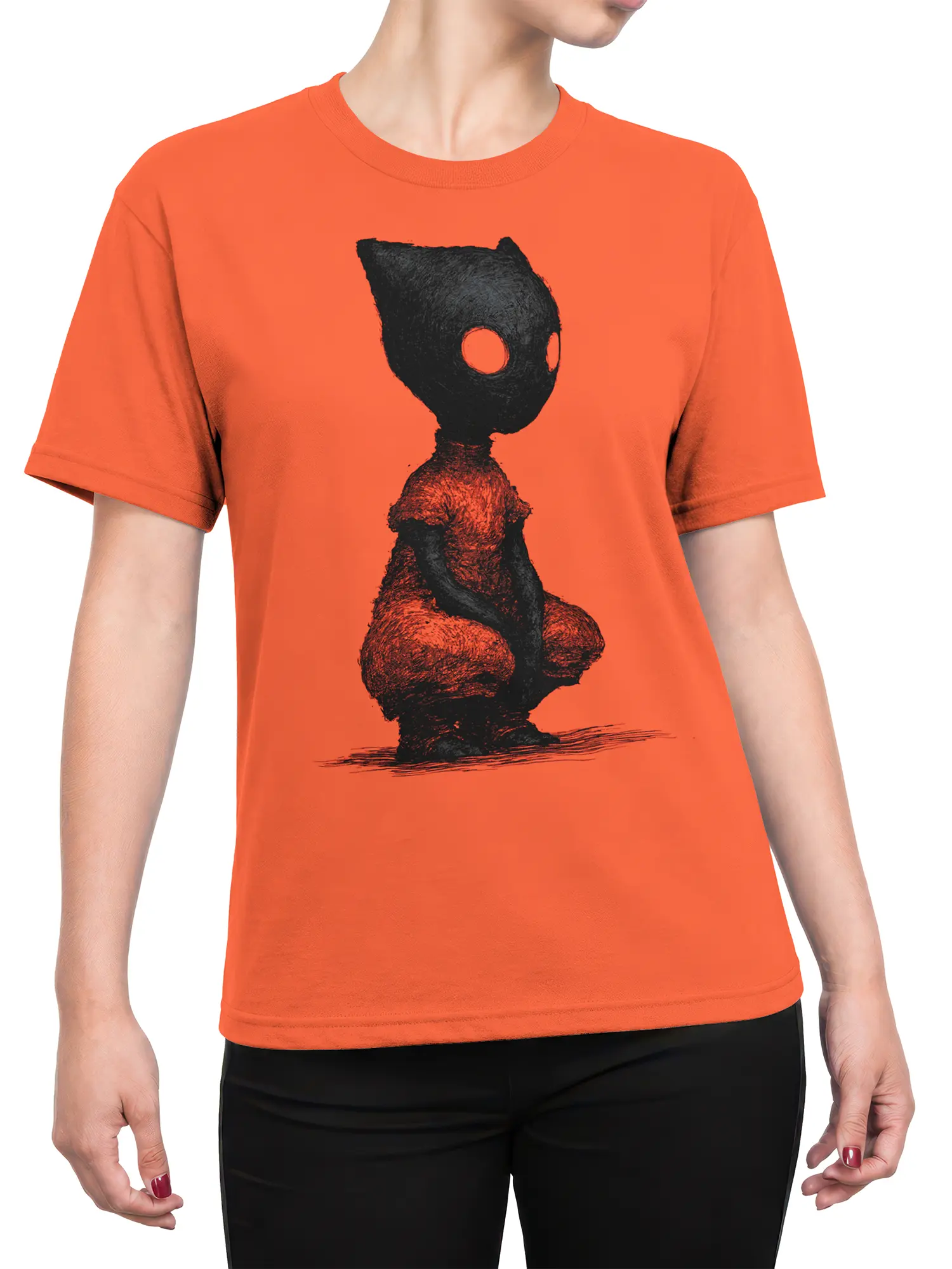 Woman wearing orange shirt with black crouching cat creature graphic centered on the front