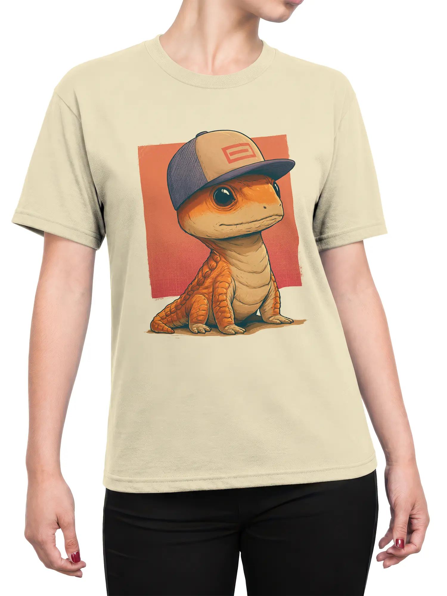 Woman wearing beige lizard graphic tee with cute orange lizard in a baseball cap