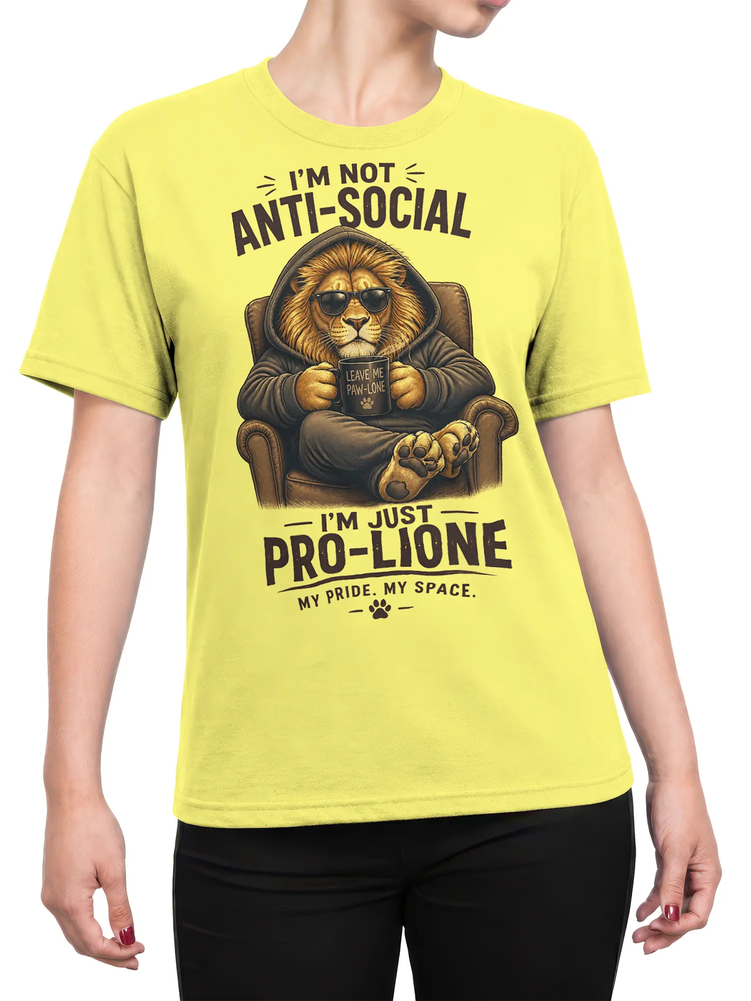 Woman wearing yellow pro-lione introvert lion t-shirt with relaxed hoodie lion and coffee mug graphic