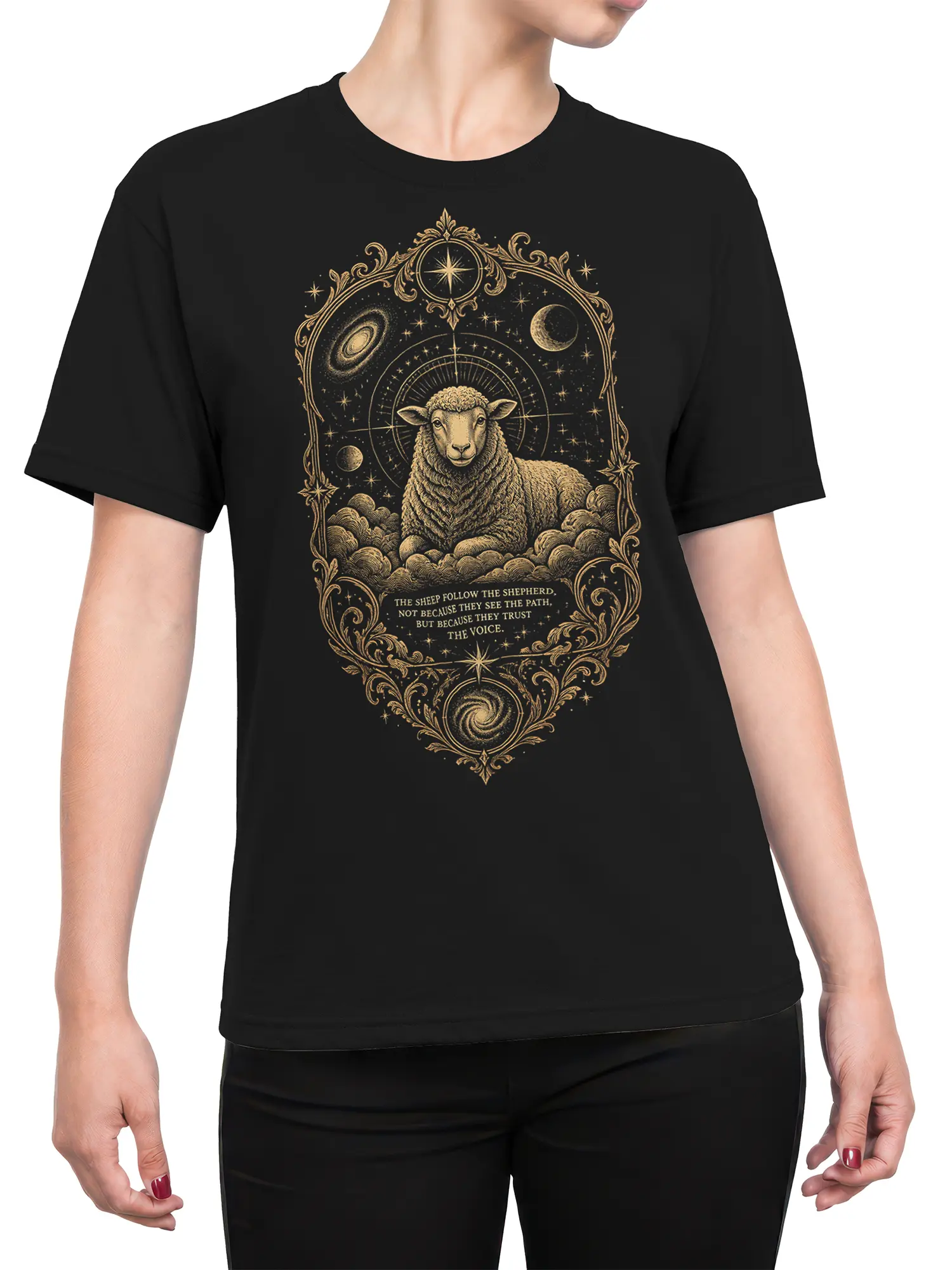 woman wearing black mystic sheep shirt with ornate gold celestial design and shepherd trust quote