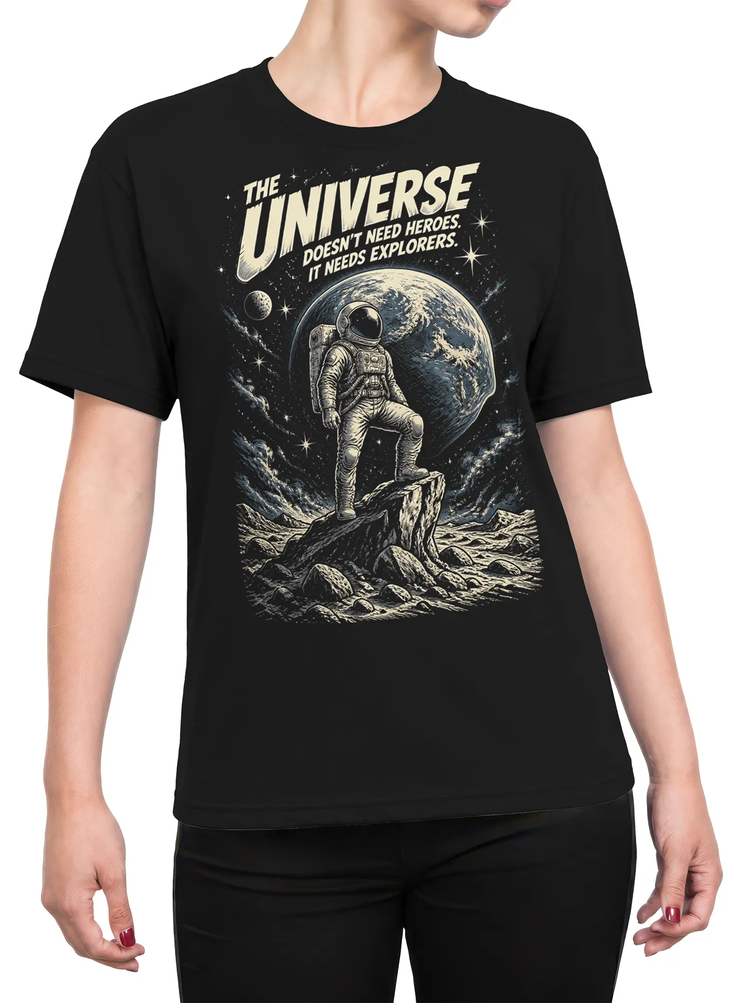 Female torso wearing a black astronaut T-shirt with retro planet artwork and the message about explorers and the universe