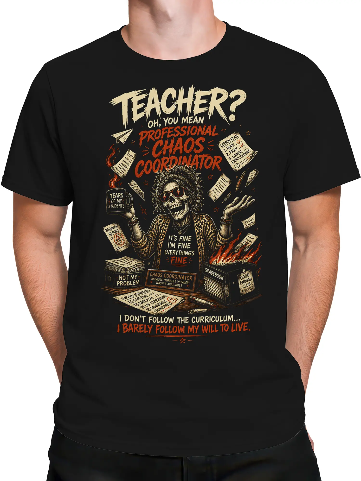 Male torso wearing a black teacher t-shirt with skull educator and dark classroom humor design