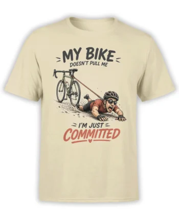 Funny beige bike T-shirt with cyclist dragged by a road bike and bold “I’m Just Committed” text
