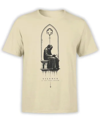 Hooded monk reading beneath a gothic arch on a beige Silence Is the First Prayer T-shirt