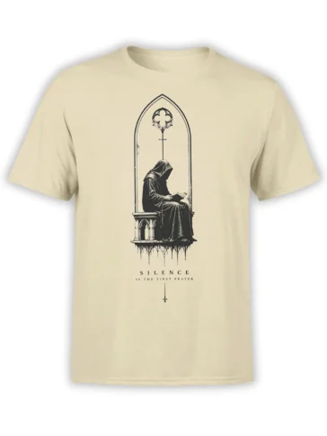 Hooded monk reading beneath a gothic arch on a beige Silence Is the First Prayer T-shirt