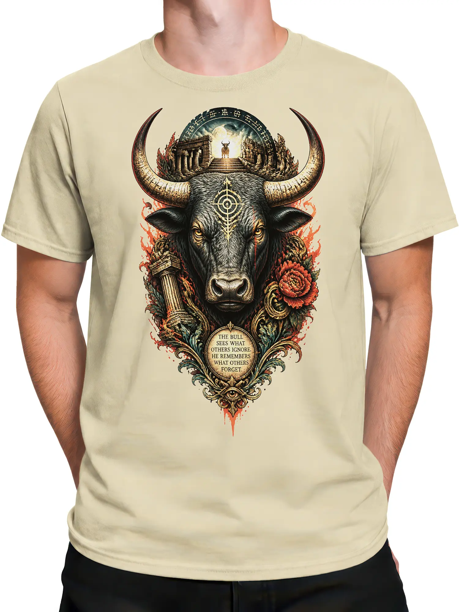 Male torso wearing beige T-shirt with detailed horned bull and ancient temple graphic