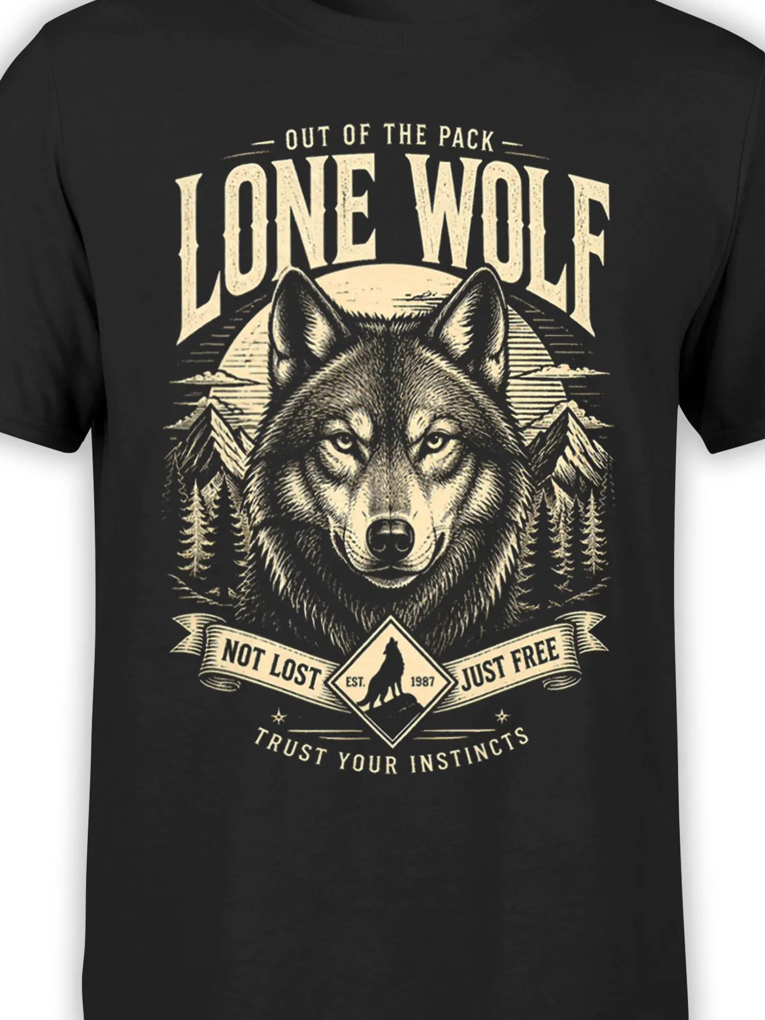 Close-up of the vintage wolf graphic and cream “Not Lost Just Free” banner on a black T-shirt