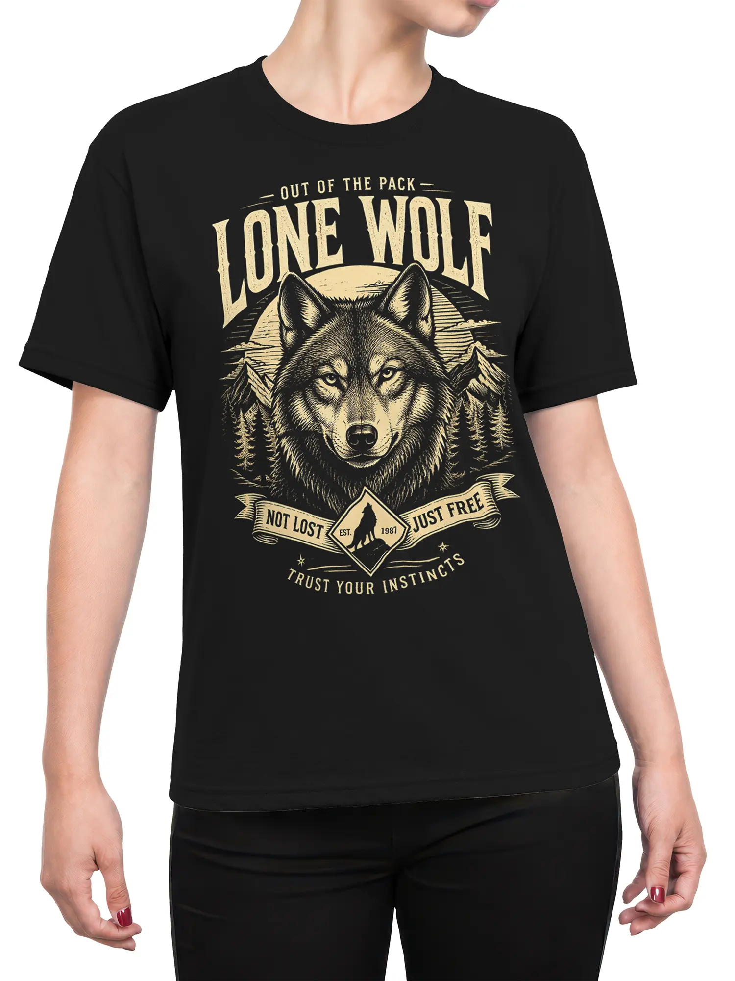Female torso wearing a black wolf T-shirt with vintage mountain scenery and bold cream lettering