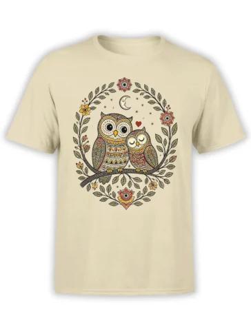 Beige owl t-shirt with two patterned owls on a branch beneath a crescent moon and flowers
