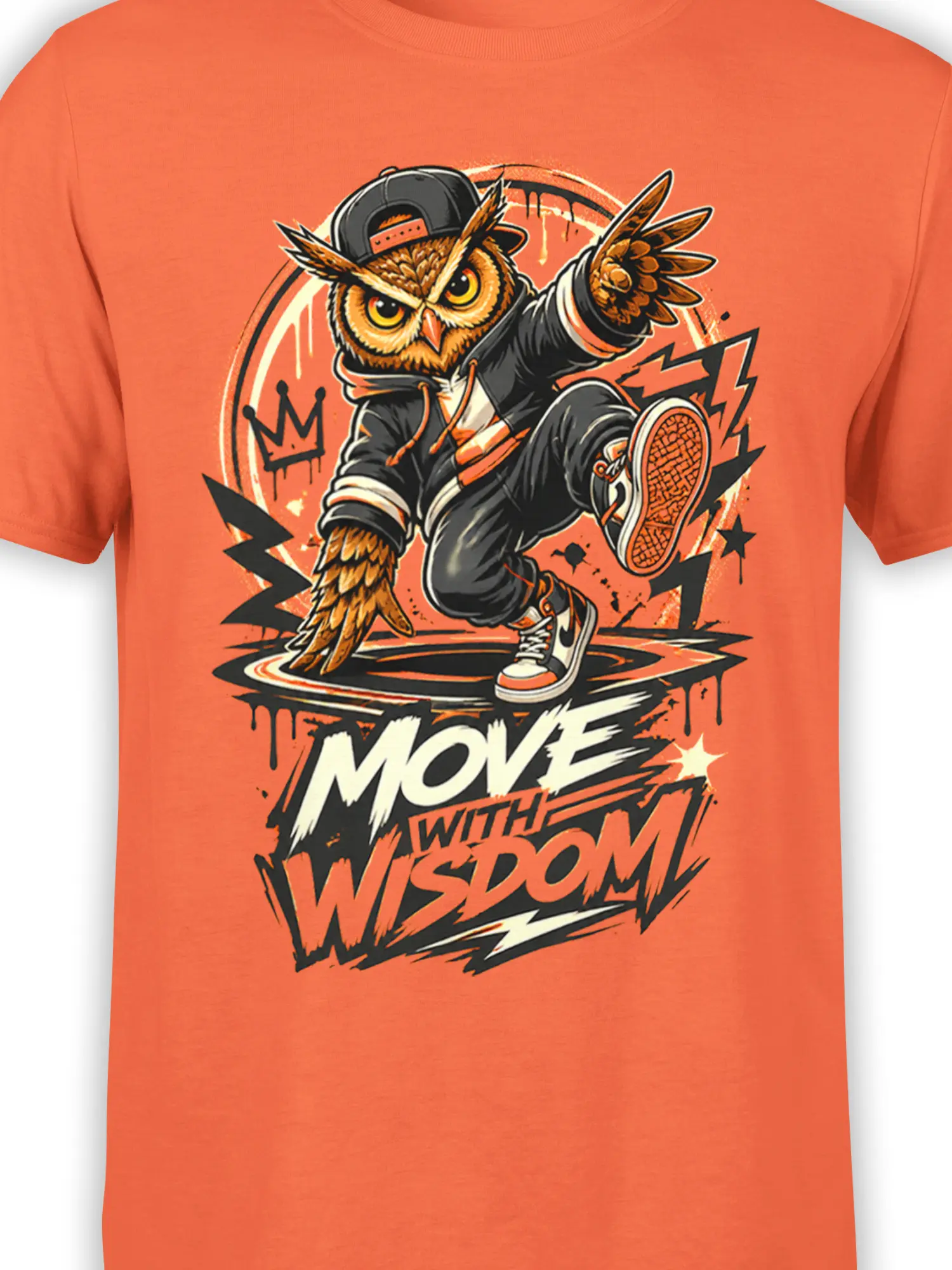 Close-up of wise owl breakdancer artwork and “Move with Wisdom” text on orange shirt