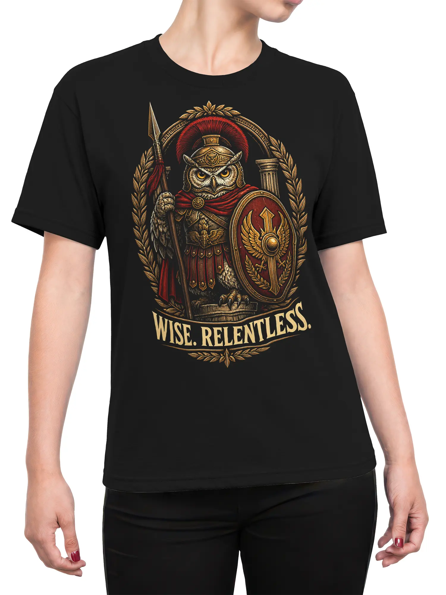 Female torso wearing a black owl warrior T-shirt with “WISE. RELENTLESS.” artwork