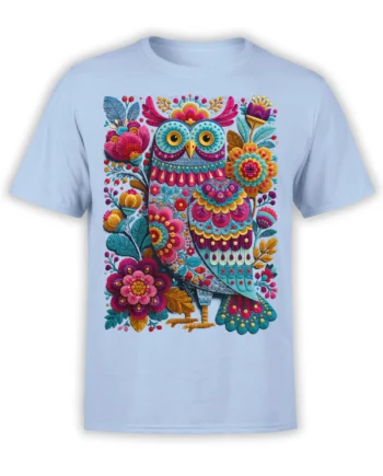 Colorful floral owl surrounded by flowers and leaves on a light blue T-shirt