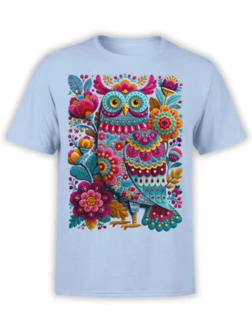 Colorful floral owl surrounded by flowers and leaves on a light blue T-shirt