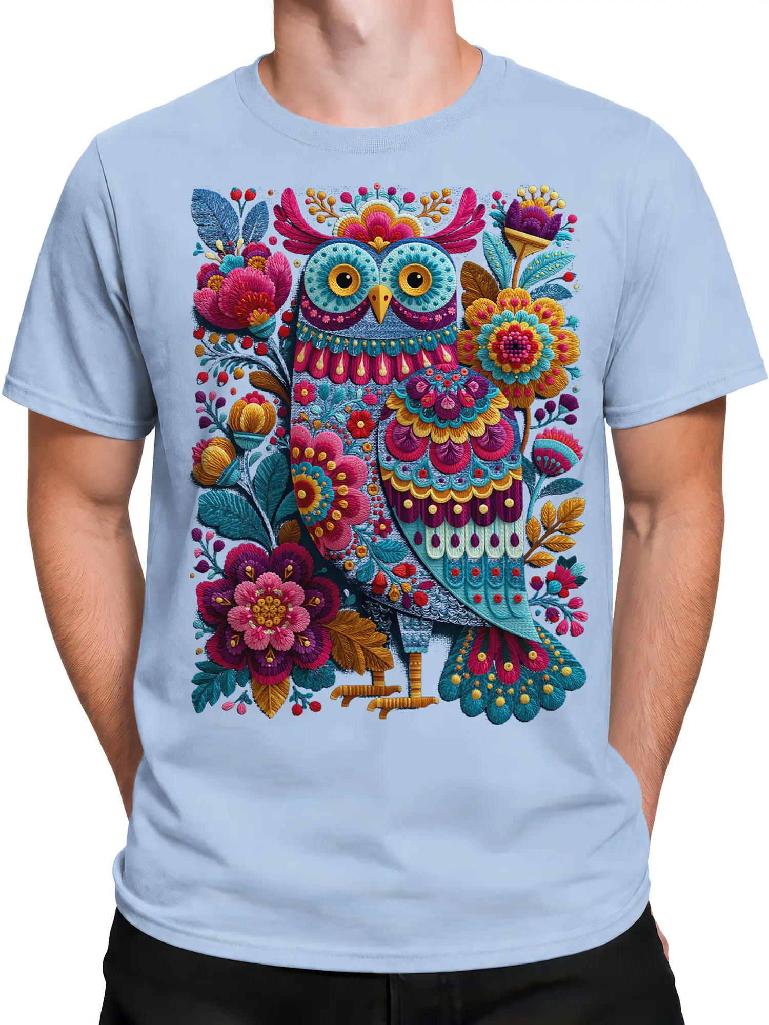 Male torso wearing a light blue T-shirt with a colorful floral owl design