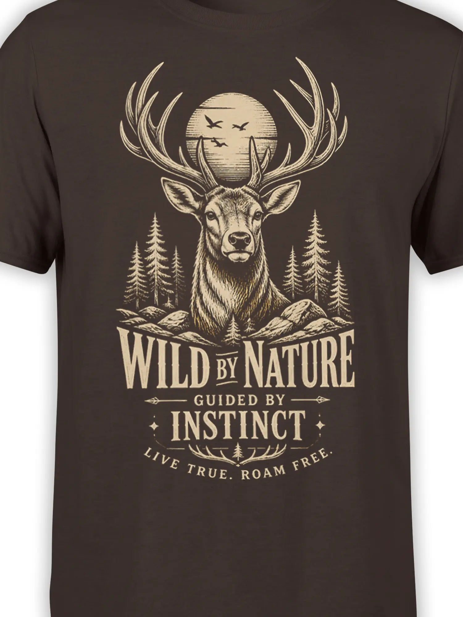 Close-up of deer antlers, moon, pine trees, and vintage “Guided by Instinct” artwork on a brown tee