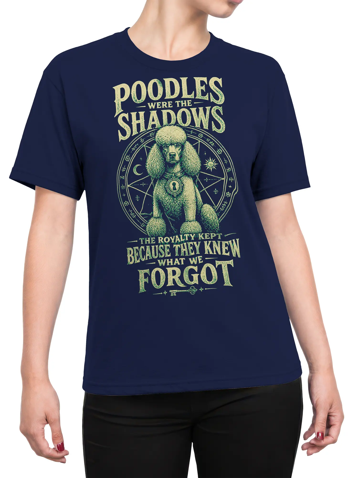 Female torso wearing a navy T-shirt with a mystical regal poodle graphic and vintage lettering