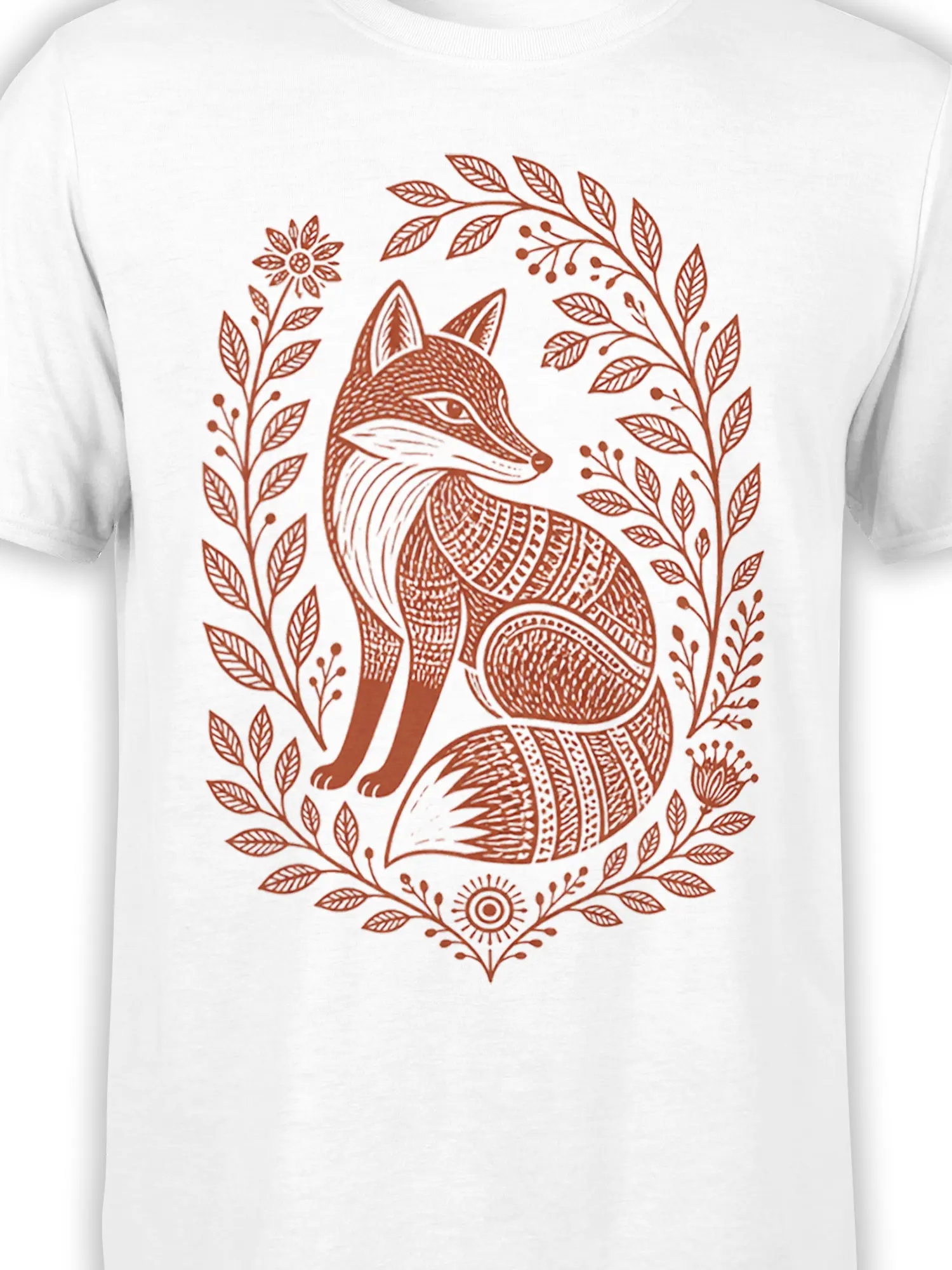 Close-up of the rust-brown folk art fox and botanical wreath printed on the white T-shirt front