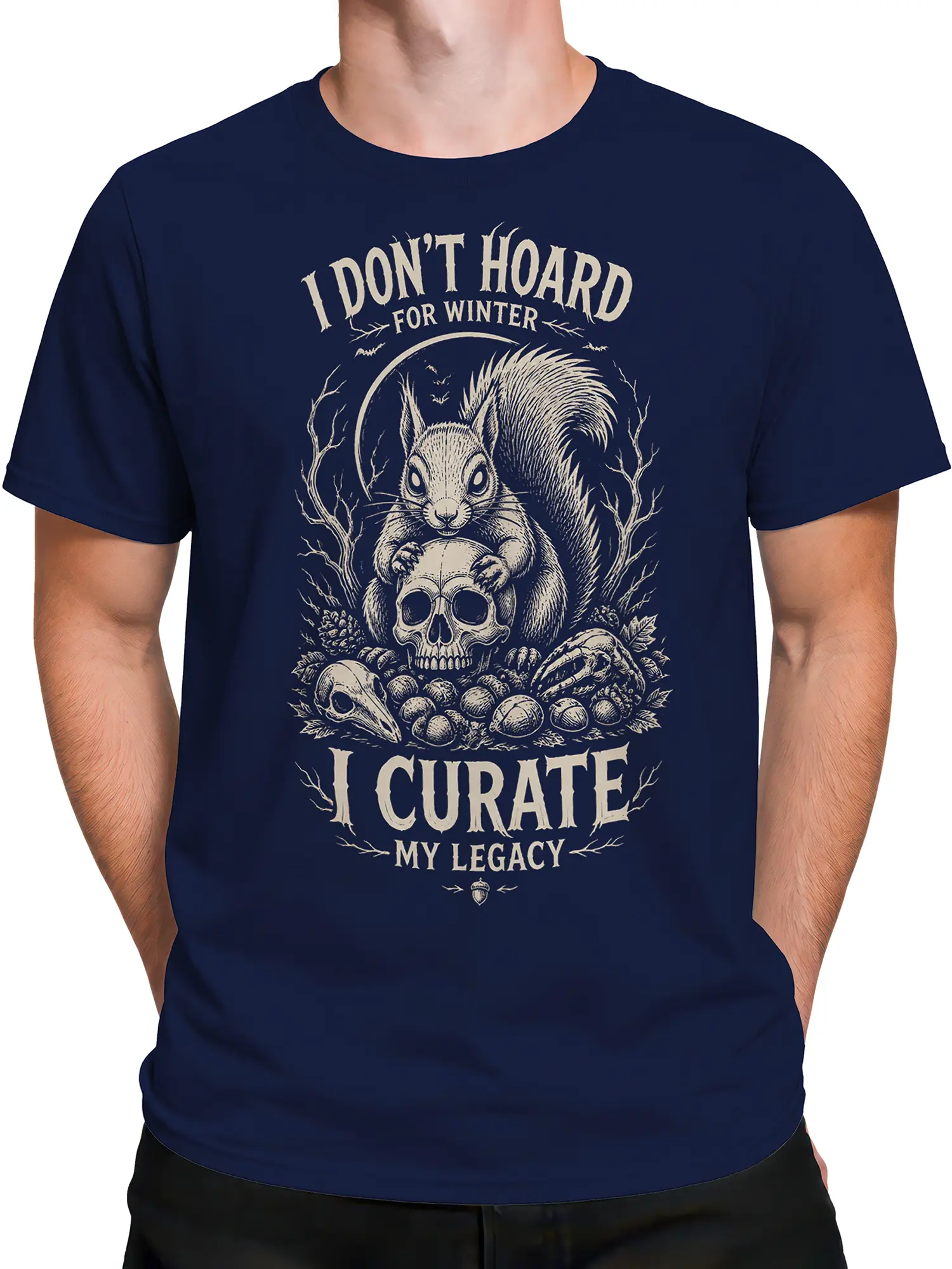 Male torso wearing a navy T-shirt with a vintage squirrel skull and woodland legacy graphic