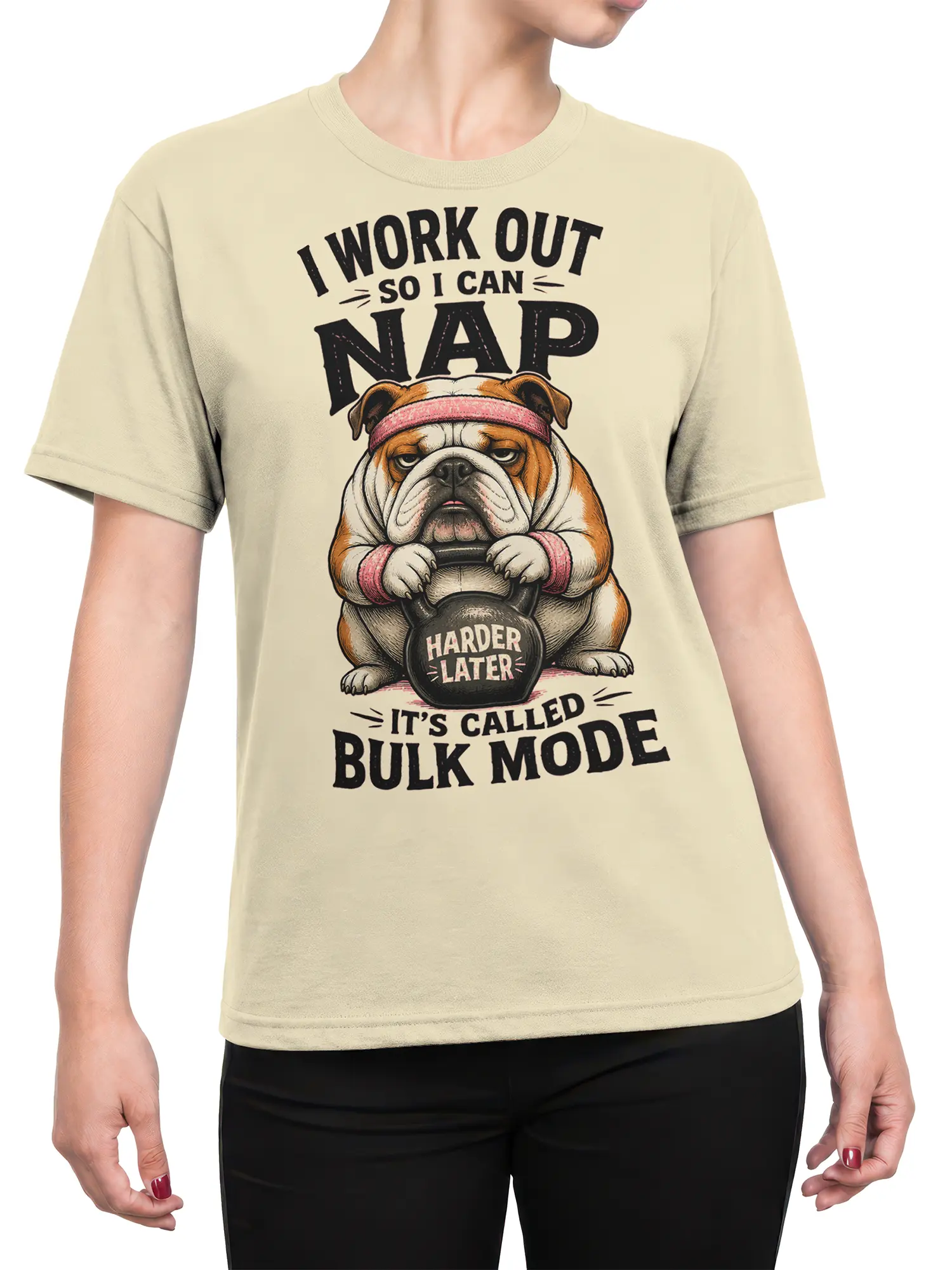 Female torso wearing a beige bulldog workout T-shirt with kettlebell and bulk mode graphic