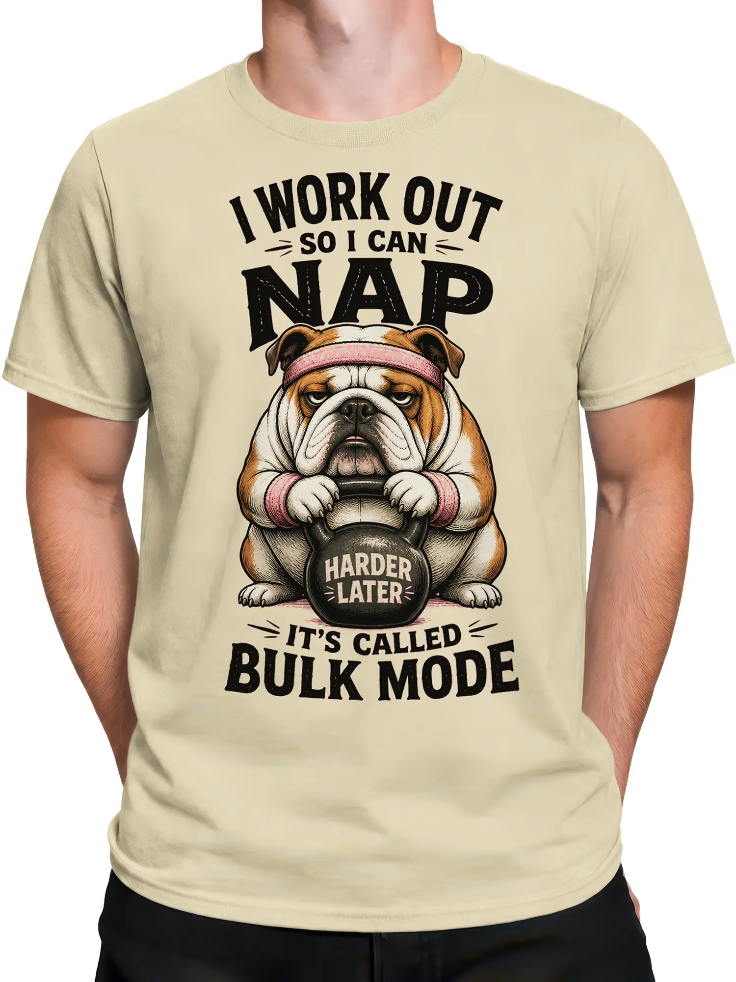 Male torso wearing a beige bulldog T-shirt with vintage kettlebell workout artwork
