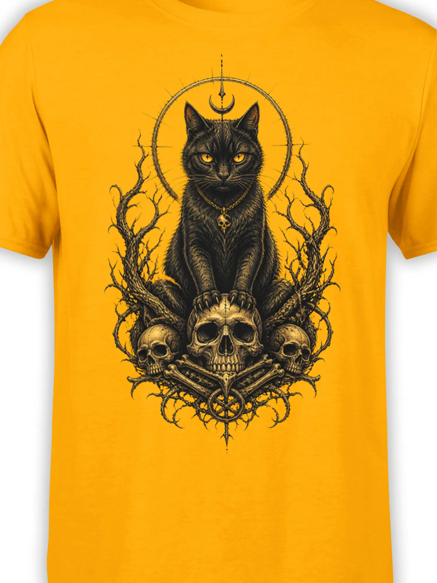 Close-up of the black cat, crescent moon, skull pendant, branches, and skull artwork on a yellow shirt