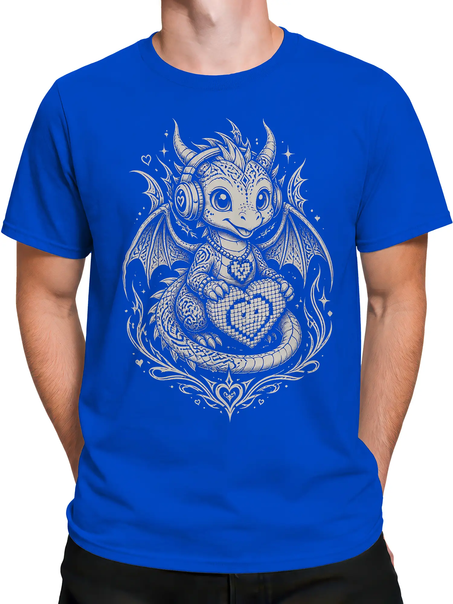 Male torso wearing a blue T-shirt with a cream horned dragon, headphones, wings, stars, and heart design