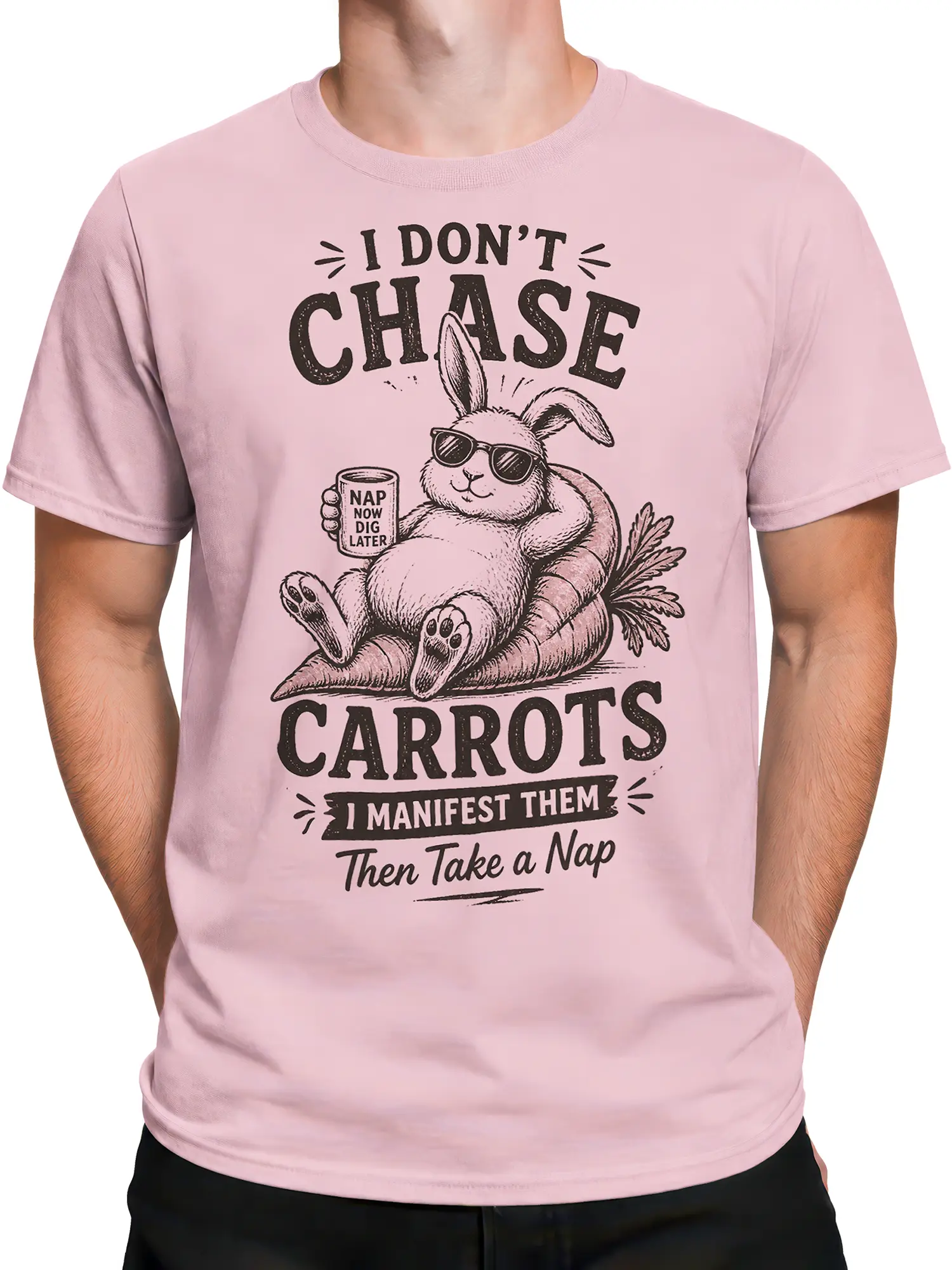 Male torso wearing a pink rabbit graphic tee with carrots, sunglasses, and humorous lettering