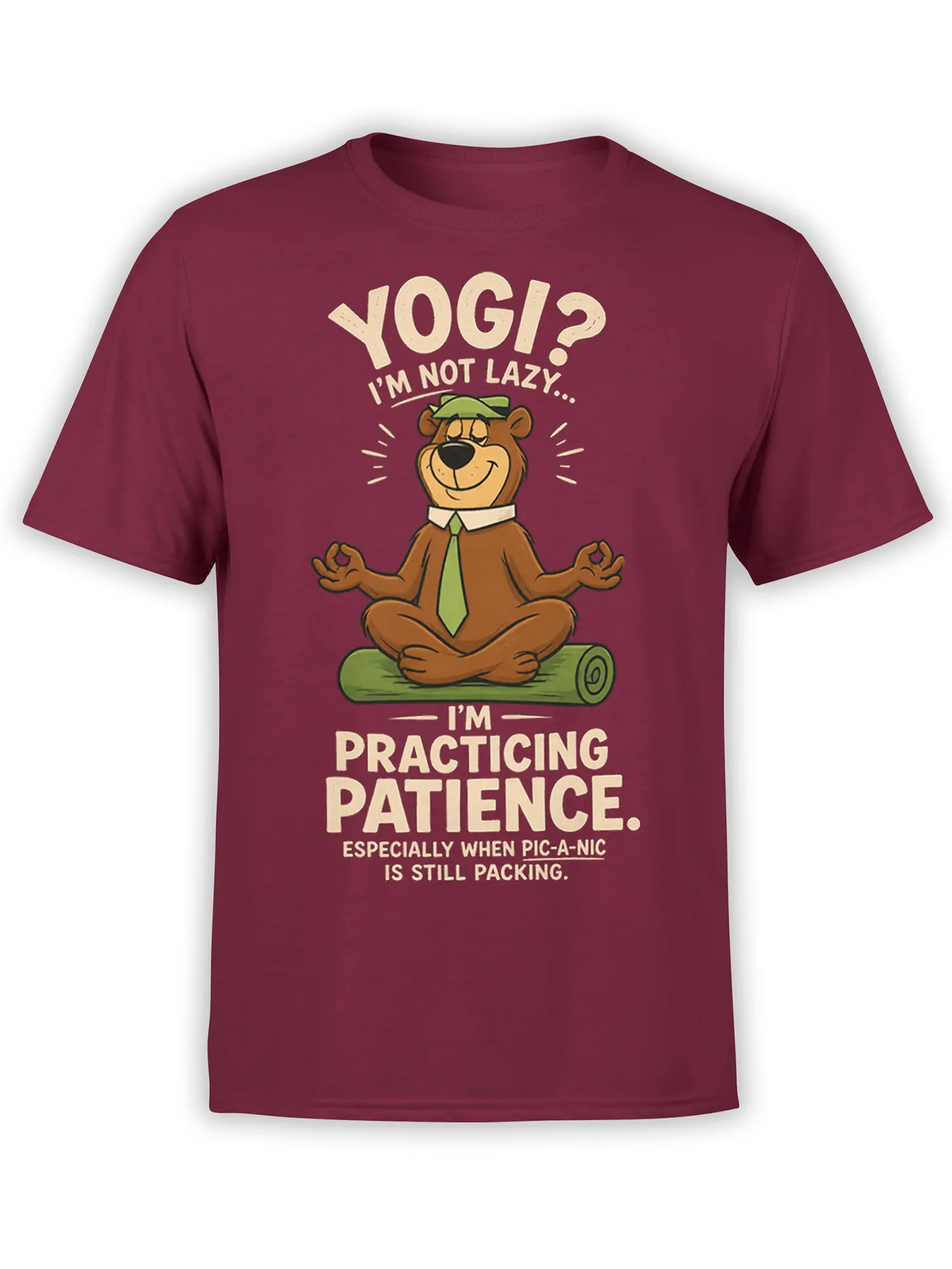 Brown cartoon bear meditating on a yoga mat with a funny picnic patience message on a burgundy T-shirt