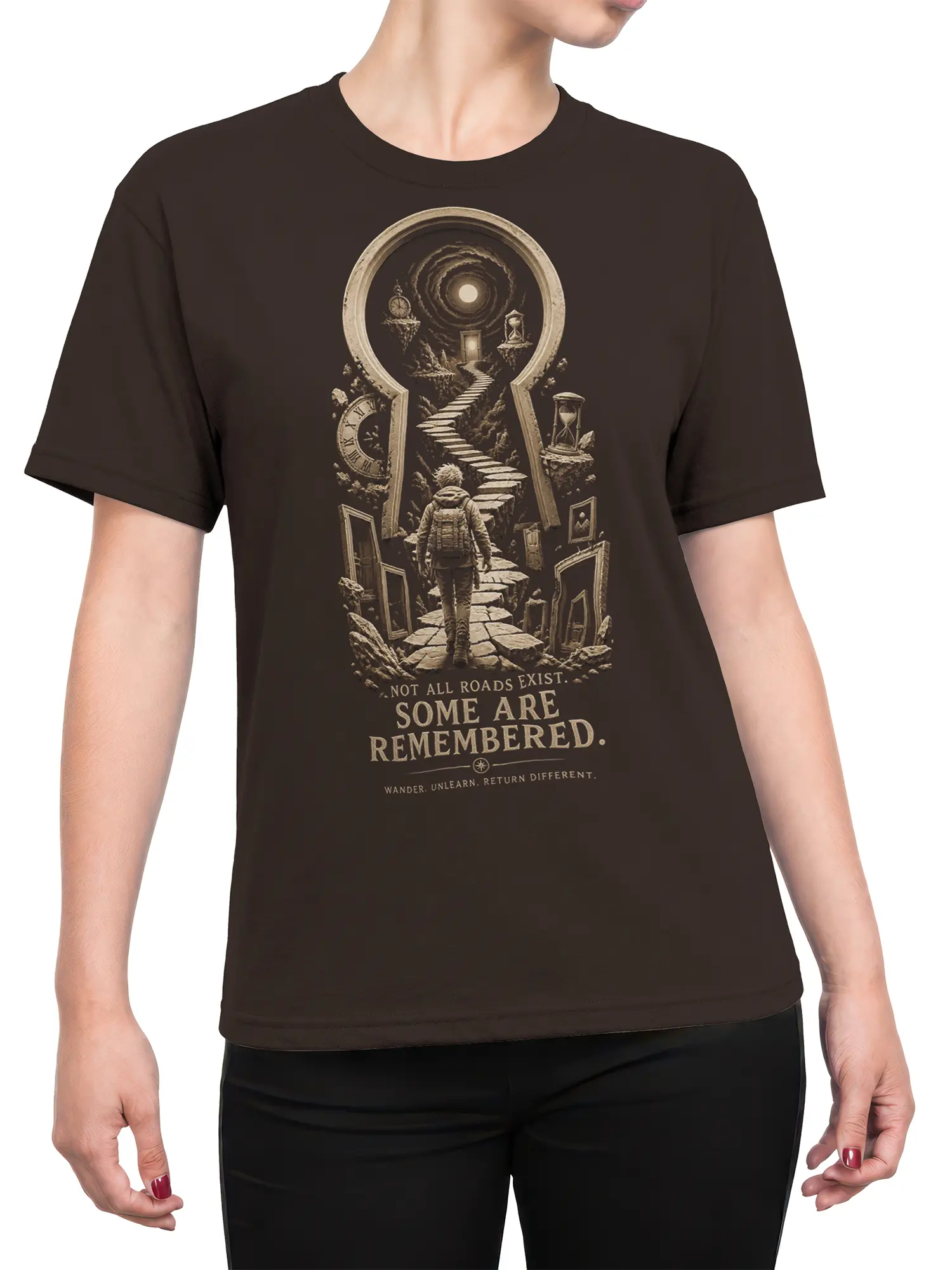 Female torso wearing a brown fantasy t-shirt with a traveler, floating doors, clocks, and the phrase Some Are Remembered