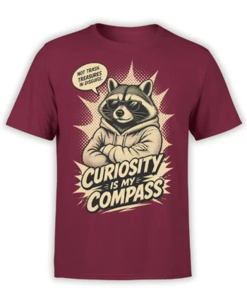 Curious raccoon in sunglasses and hoodie on a burgundy T-shirt with “Curiosity Is My Compass” text