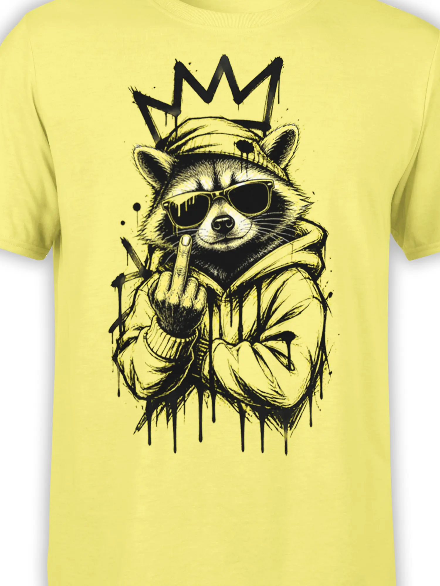 Close-up of crowned raccoon artwork with sunglasses and hoodie on a yellow T-shirt
