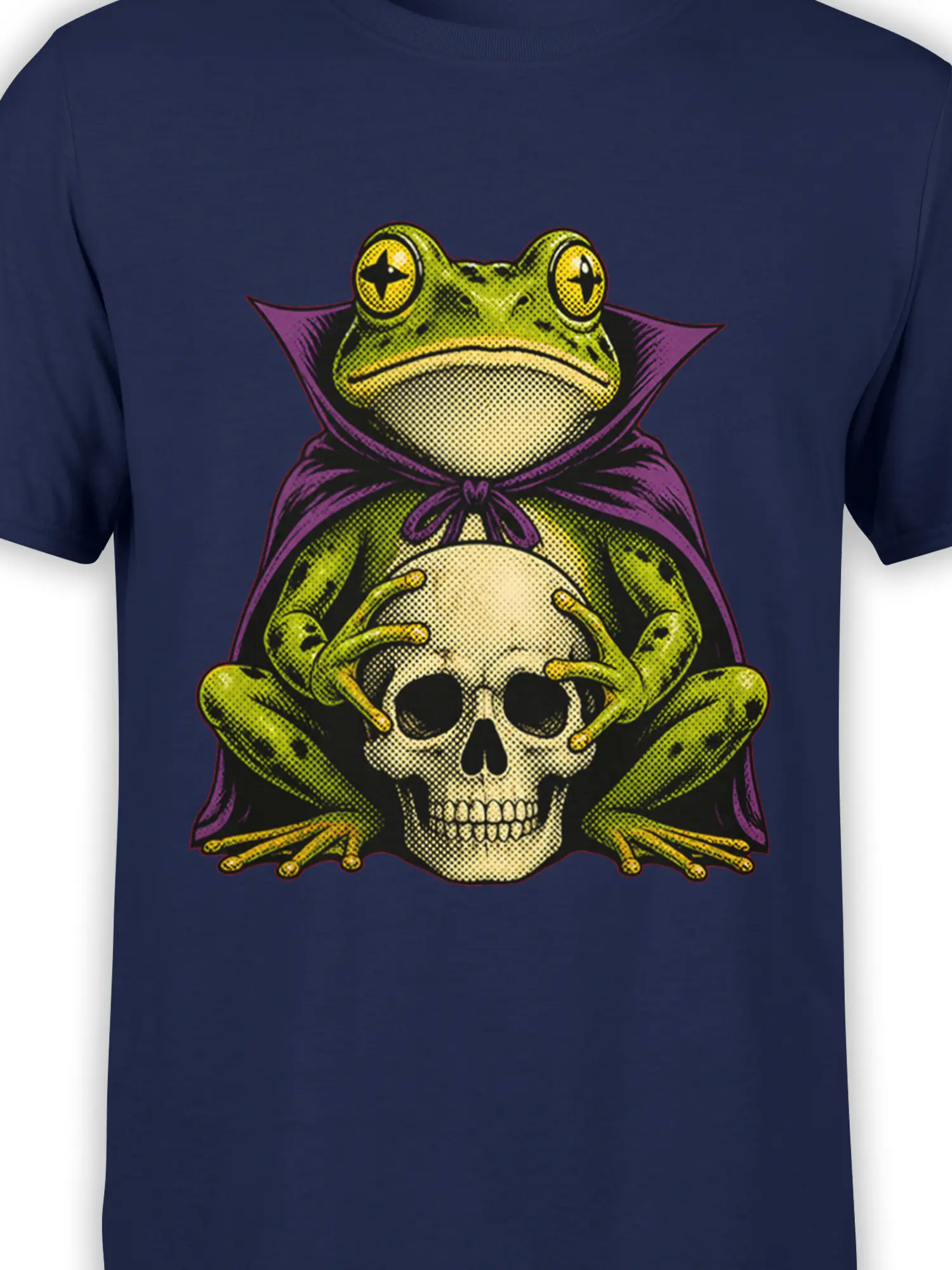 Close-up of the caped frog and skull graphic with green, purple, yellow, and black comic details