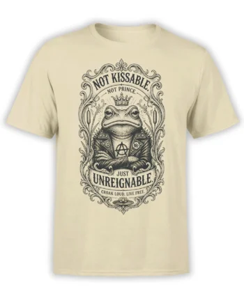 Beige T-shirt featuring a crowned punk frog in a studded jacket with ornate vintage lettering and a rebellious message
