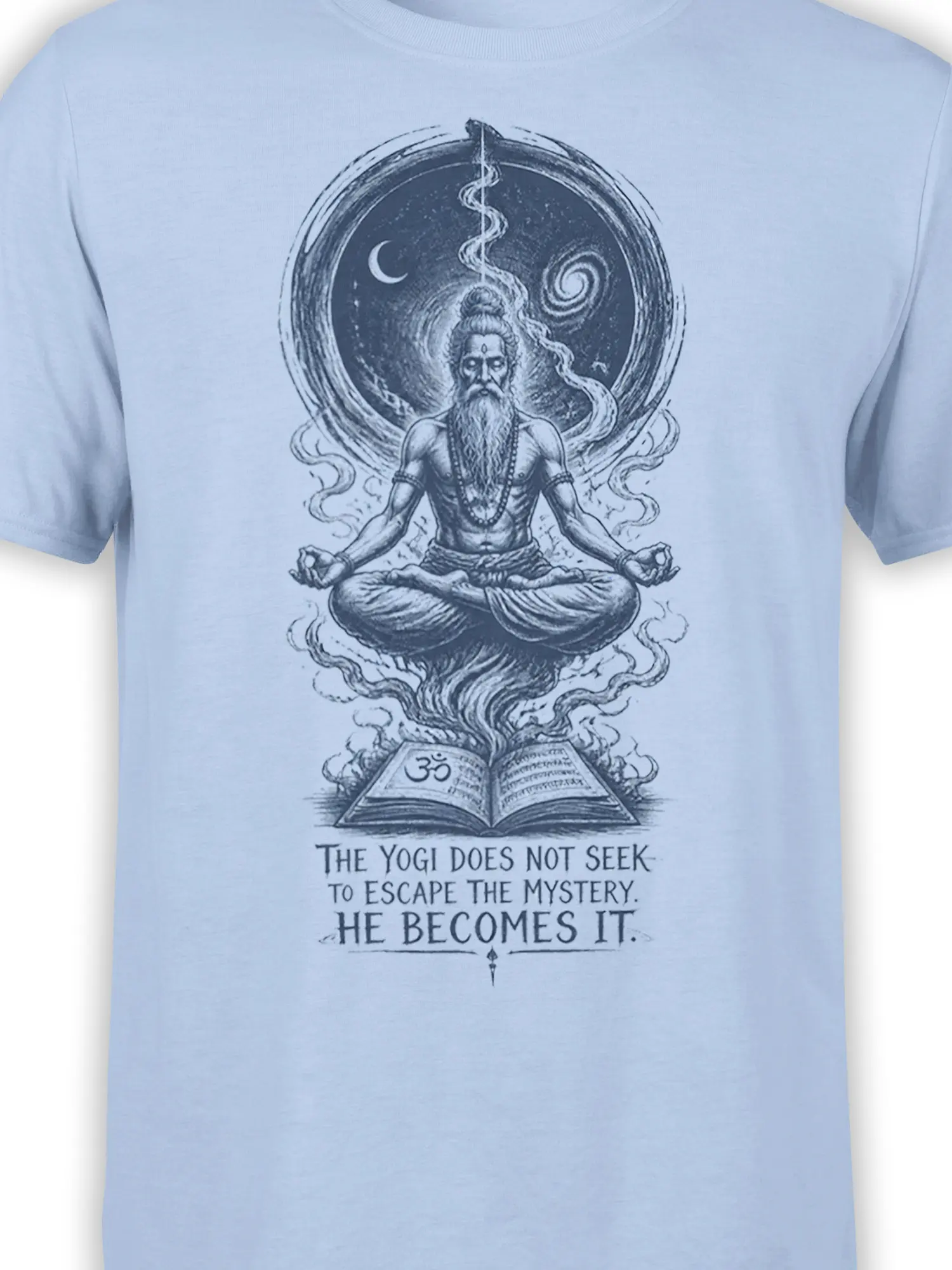 Close-up of meditating yogi artwork with crescent moon, Om symbol, open book, and quote on light blue fabric